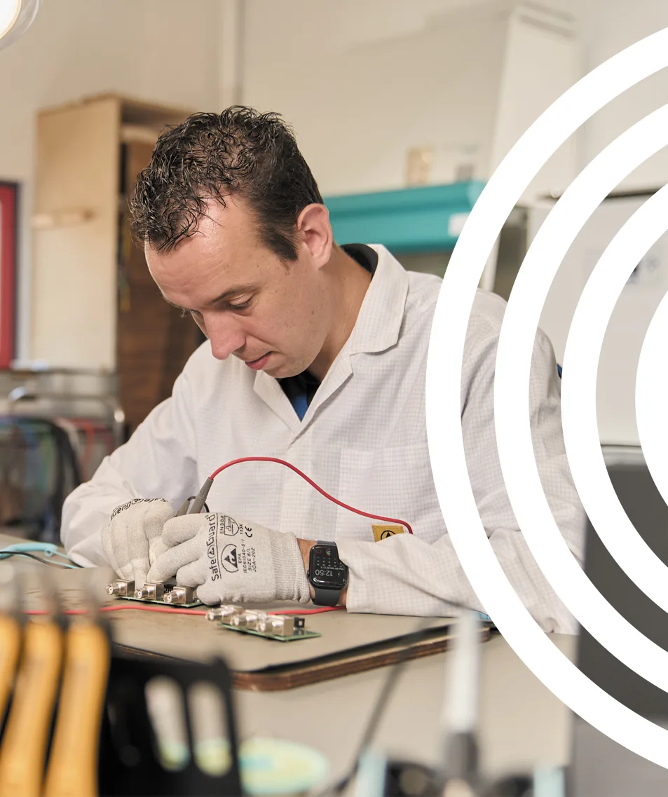 Engineer testing a coil element